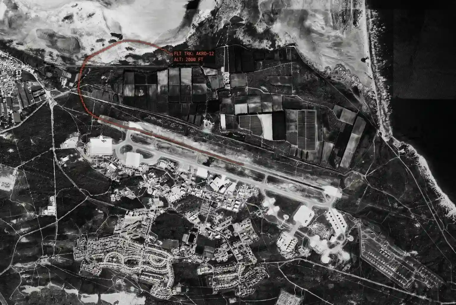 A high-contrast black-and-white satellite image of the RAF Akrotiri airfield, overlaid with a red digital flight track simulating open-source intelligence data of an aircraft on approach.